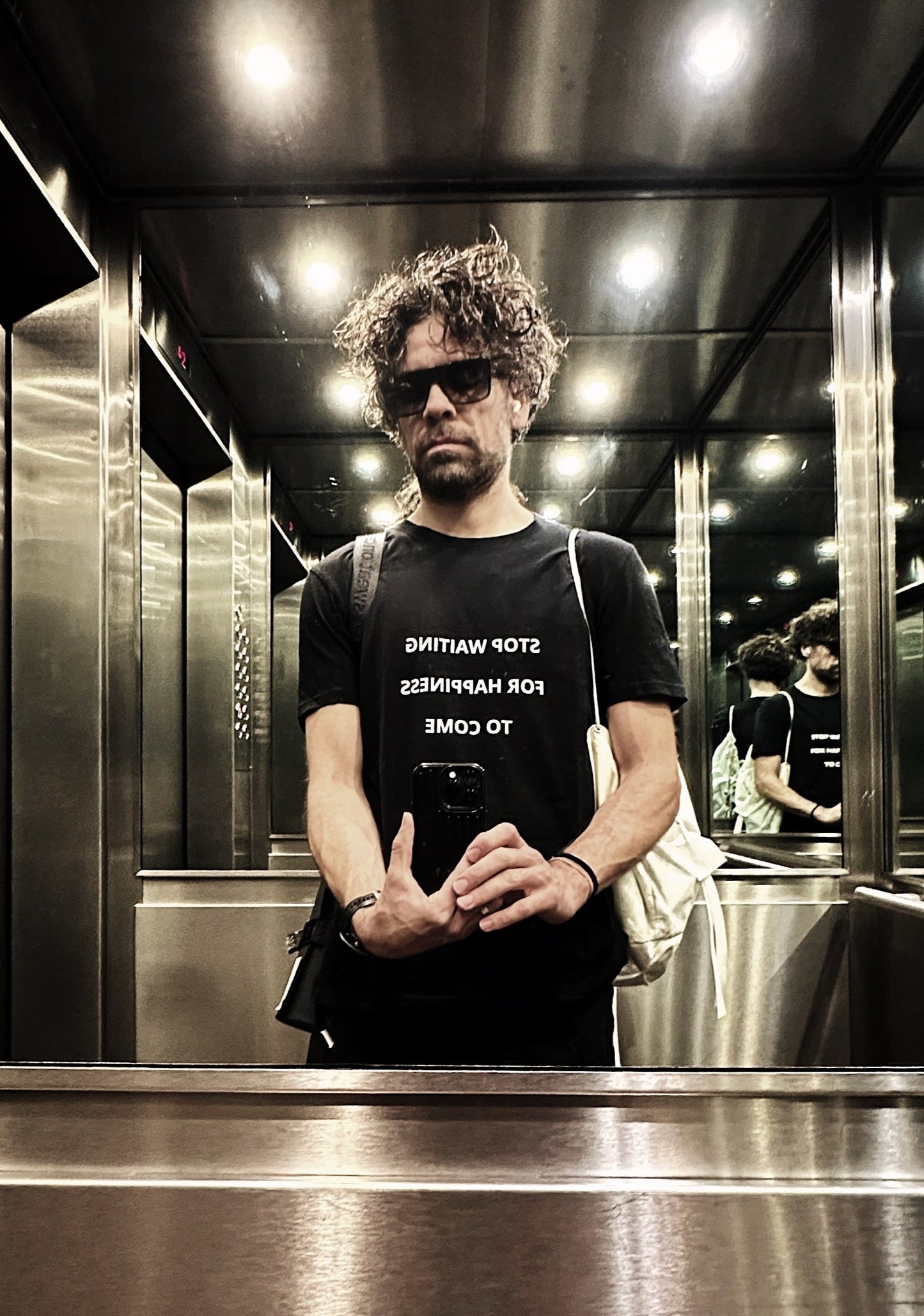 Stop Waiting For Happiness To Come Unisex organic cotton t-shirt